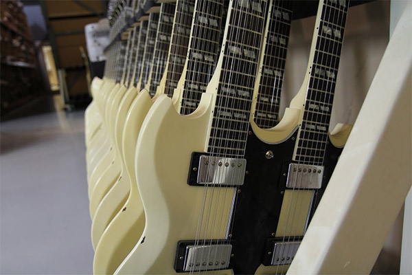 Alex Lifeson of RUSH signing guitars at the Gibson Custom Shop