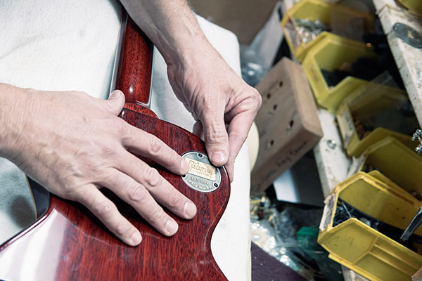 Gibson Custom Shop badges on guitars