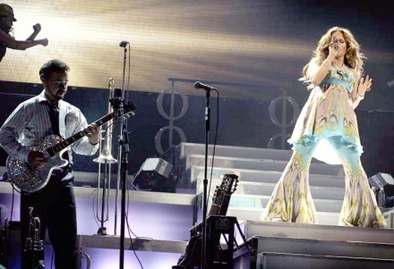 Jennifer Lopez and Guitarist Angel Fernandez playing a Gibson Les Paul Jennifer Lopez and Guitarist Angel Fernandez playing a Gibson Les Paul