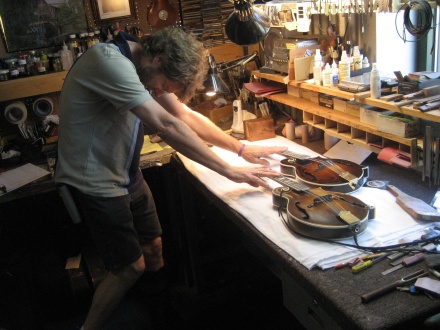 Sam Bush "blessing" Meiers' mandolin alongside "Ole Hoss" Sam Bush "blessing" Meiers' mandolin alongside "Ole Hoss"